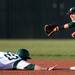 Eastern senior Ben Magsig slides back to second base as he beats Michigan State senior Justin Scanlon to the bag as Eastern takes on Michigan State at Oestrike Stadium on Wednesday.  Melanie Maxwell I AnnArbor.com